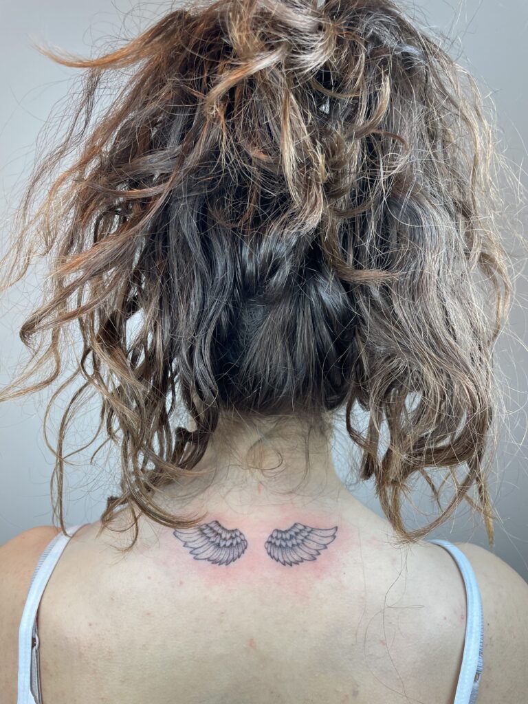 finelines tattoo expert Zürich altststetten minimalistic mini tattoo angel