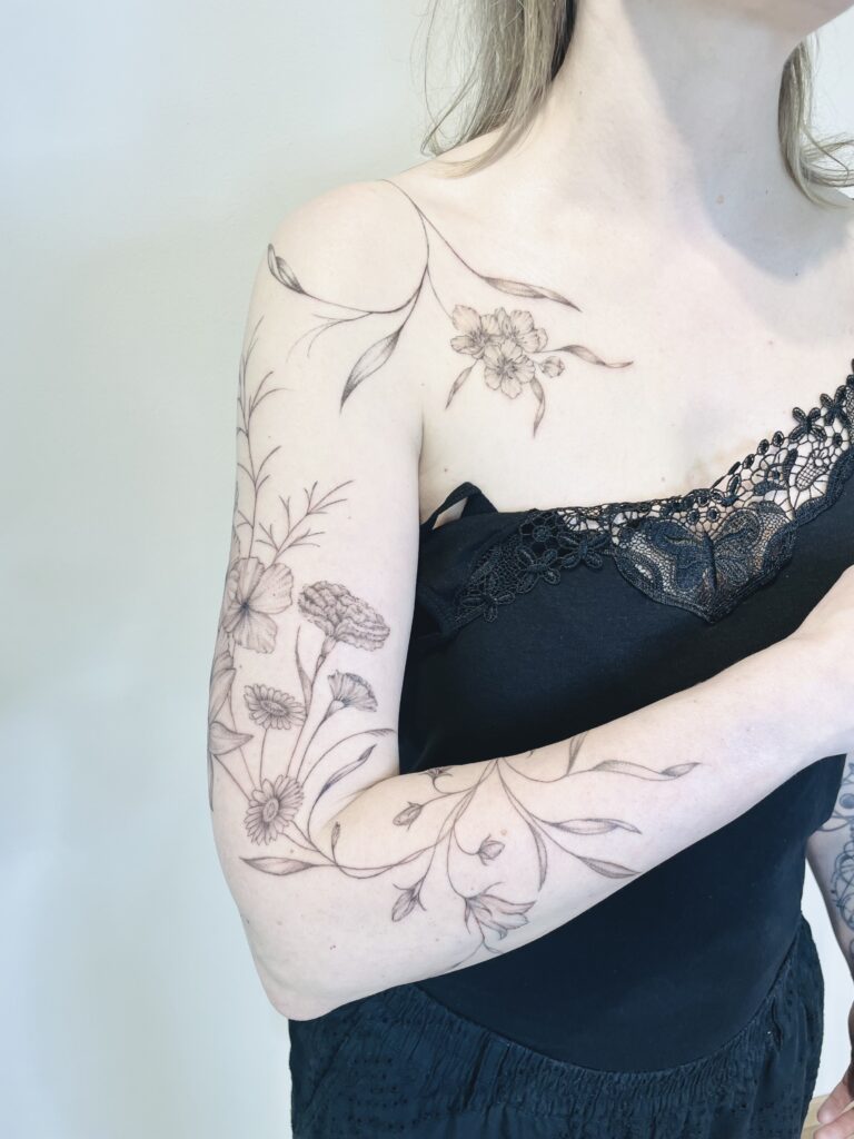 finelines tattoo expert Zürich Altstetten minimalistic freehand fullsleeve wilde blumen