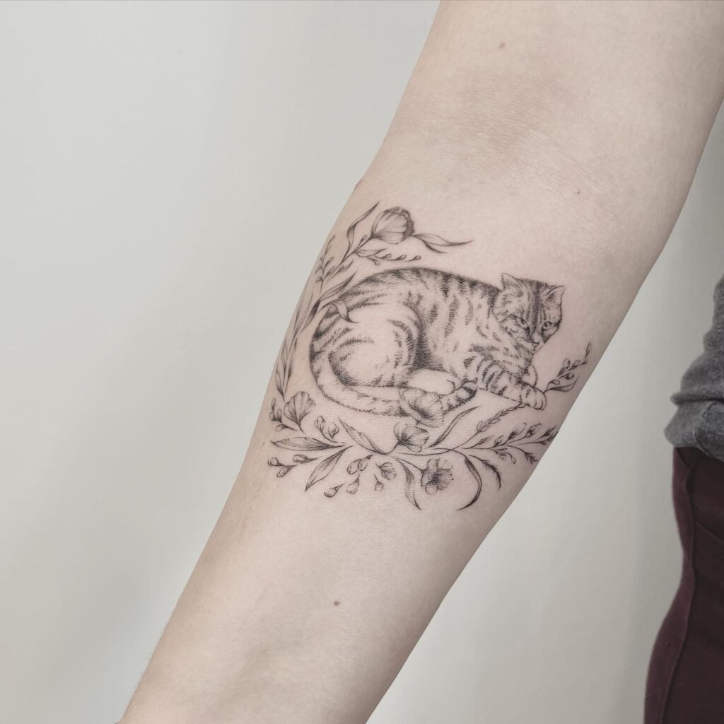 finelines tattoo expert Zürich altststetten minimalistic mini tattoo cat portrait