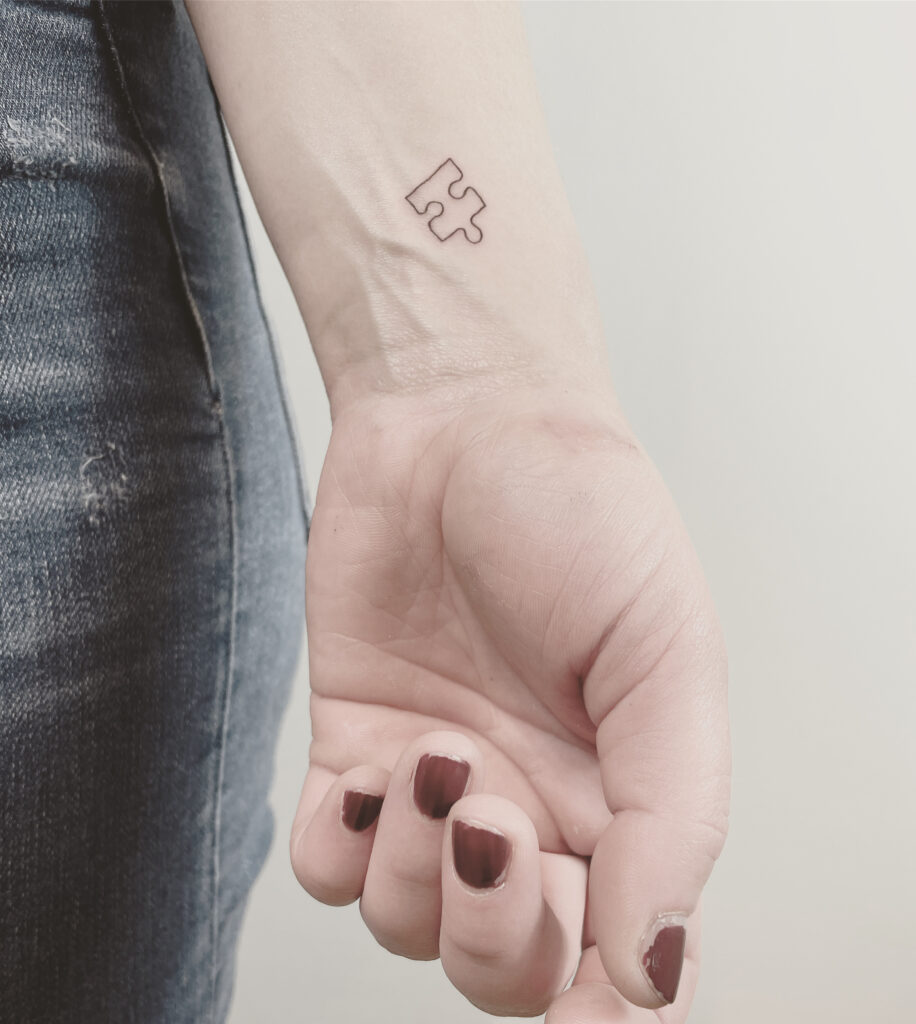 finelines tattoo expert Zürich altststetten minimalistic mini tattoo puzzle
