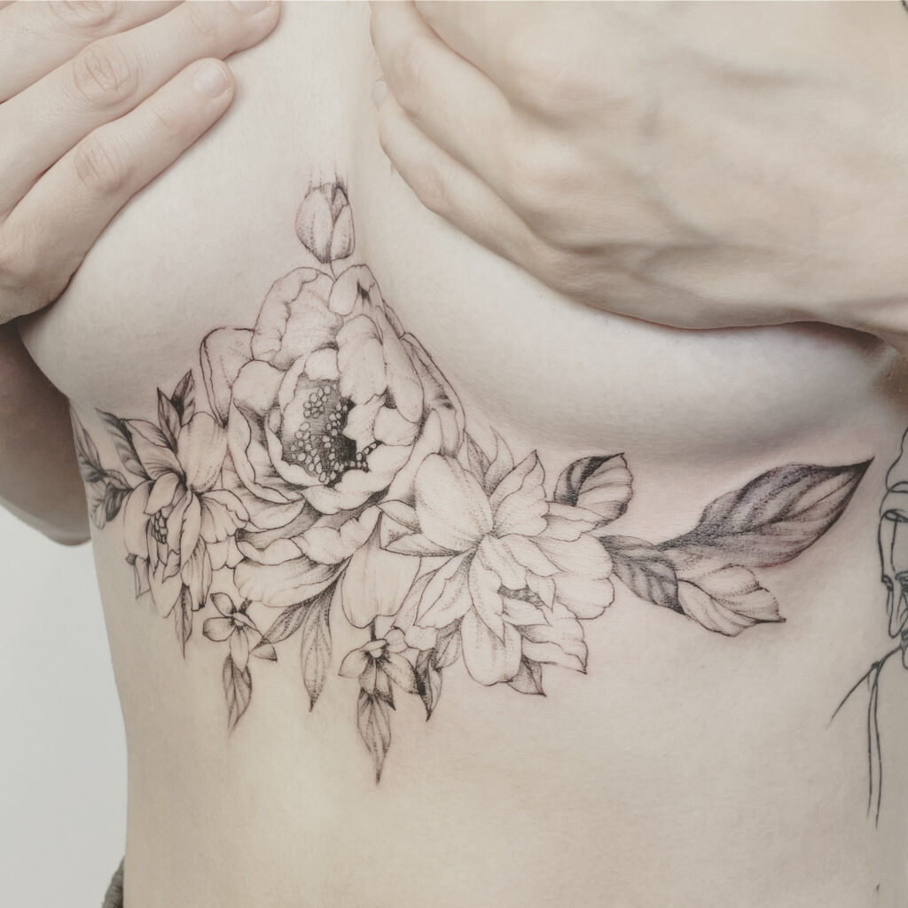 finelines tattoo expert Zürich Altstetten minimalistic linework freehand flower