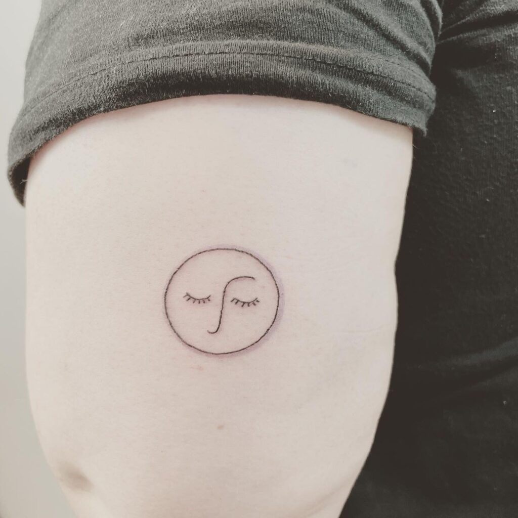 finelines tattoo expert Zürich altststetten minimalistic mini tattoo face moon