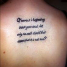 unreadable tattoo